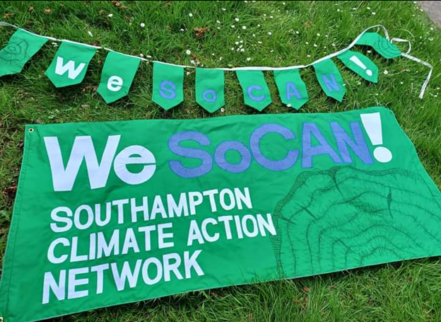 A picture of a banner and flags made for SoCAN by Sue Badcrumble